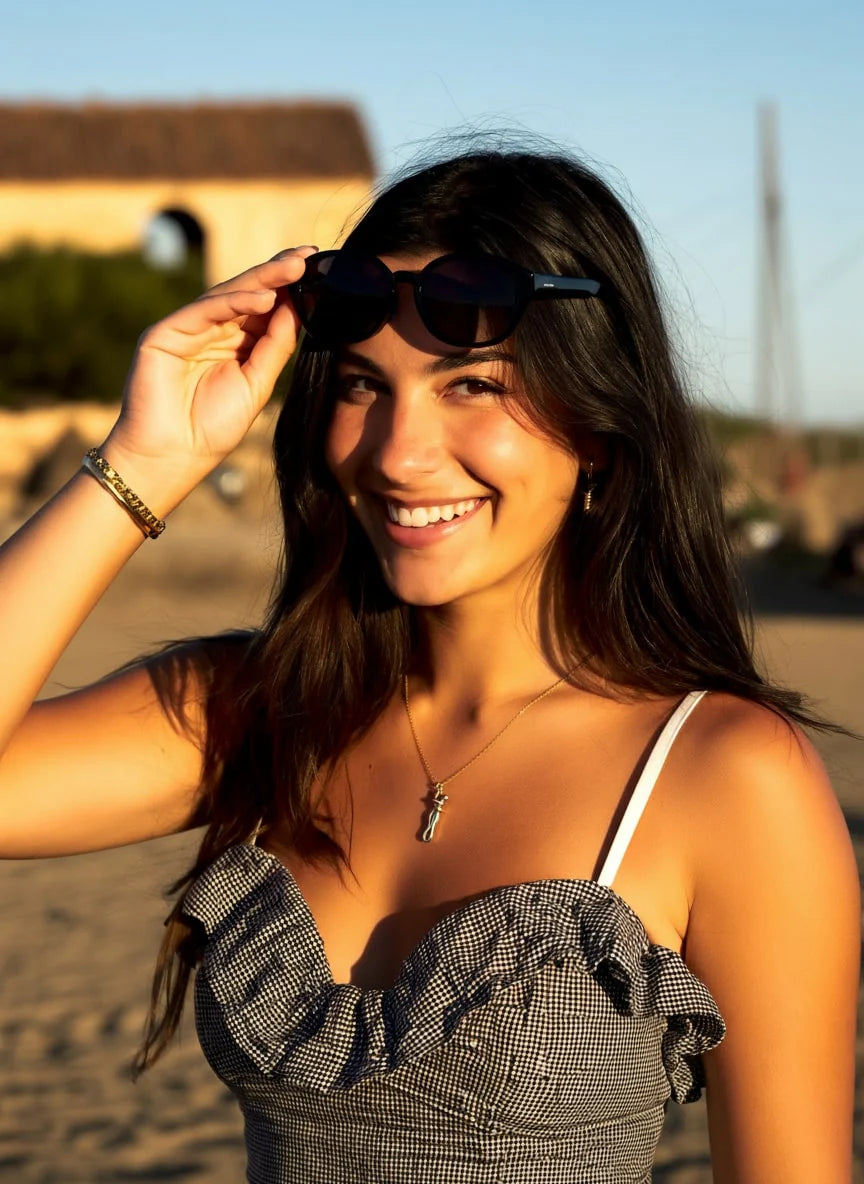 The hug necklace worn at the beach