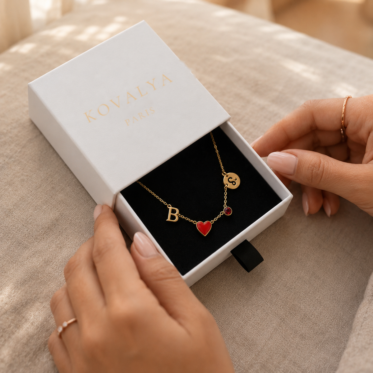 Heart initial necklace in its Kovalya gift box