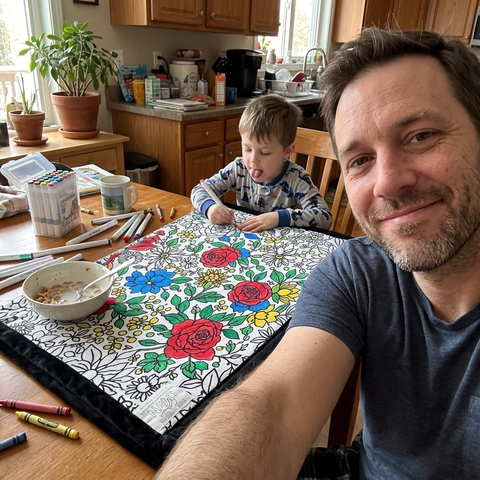 Father and son colouring the blanket